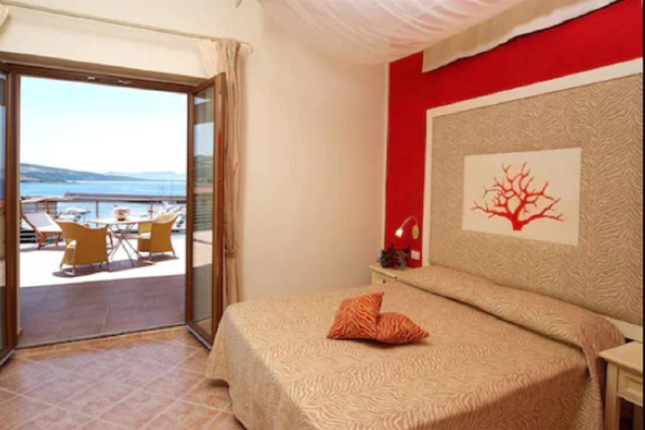 Hotel Corallo Isola Rossa Room photo